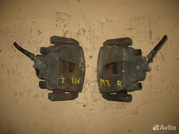 Суппорт тормозной передний Mazda 3 BL