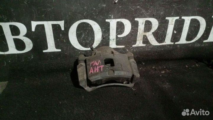 Передний тормозной суппорт Mitsubishi Galant