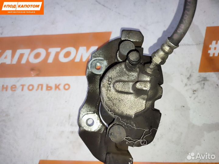 Суппорт тормозной передний левый Mazda 3 BK рест