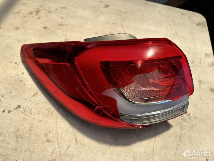 Фонарь левый Kia Sportage 3 диодный LED