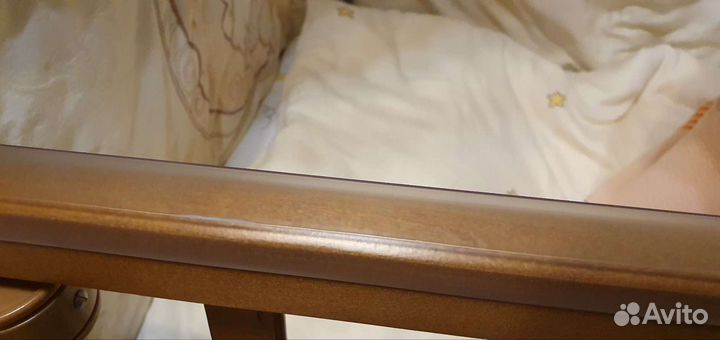 Детская кроватка с поперечным маятником