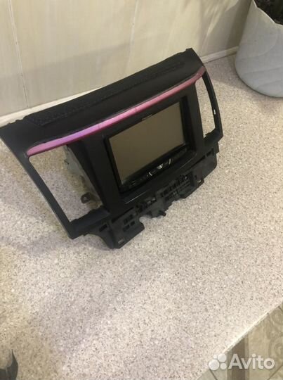 Магнитола на митсубиши лансер 10