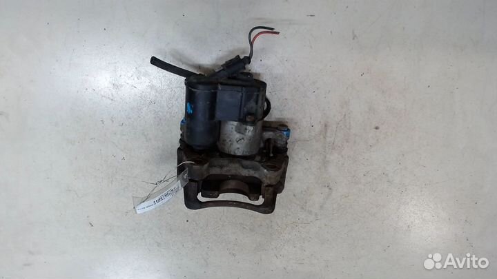 Суппорт левый задний Volkswagen Passat 6