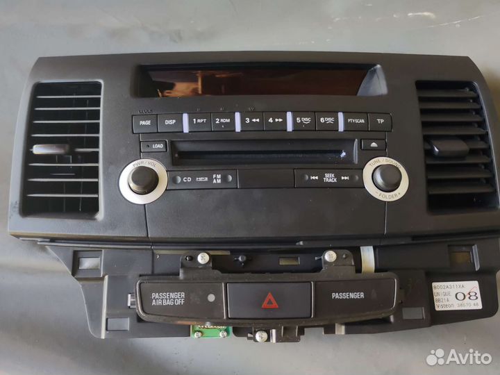 Панель управления магнитолой лансер 10