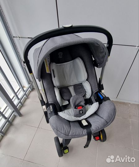 Коляска автокресло doona с базой isofix