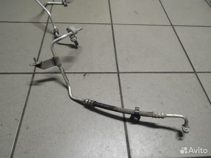 Трубка кондиционера Рено Логан 2