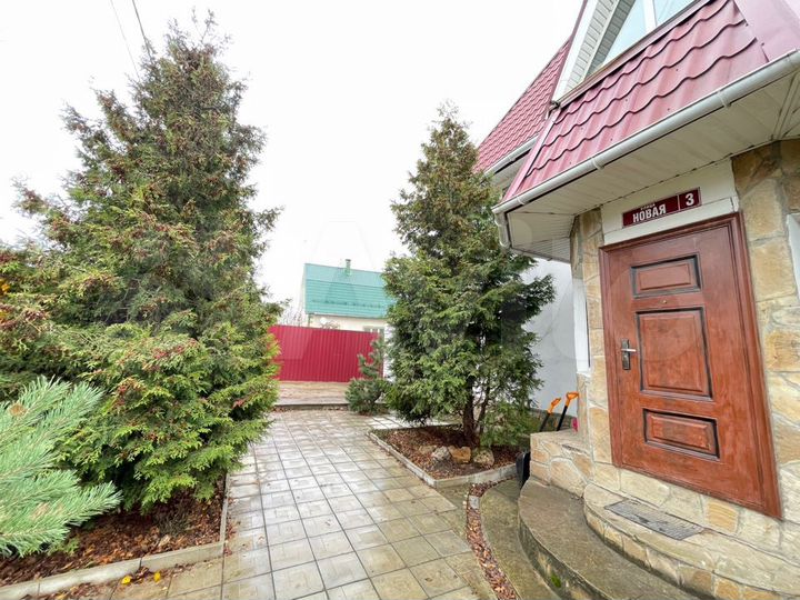 Коттедж 448 м² на участке 14 сот.