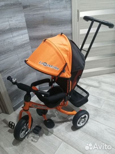 Детский трехколесный велосипед с ручкой