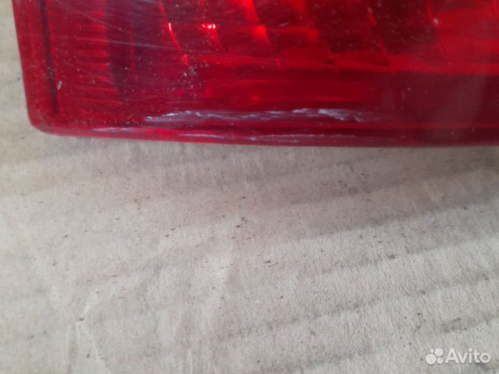 Фонарь задний левый калина универсал