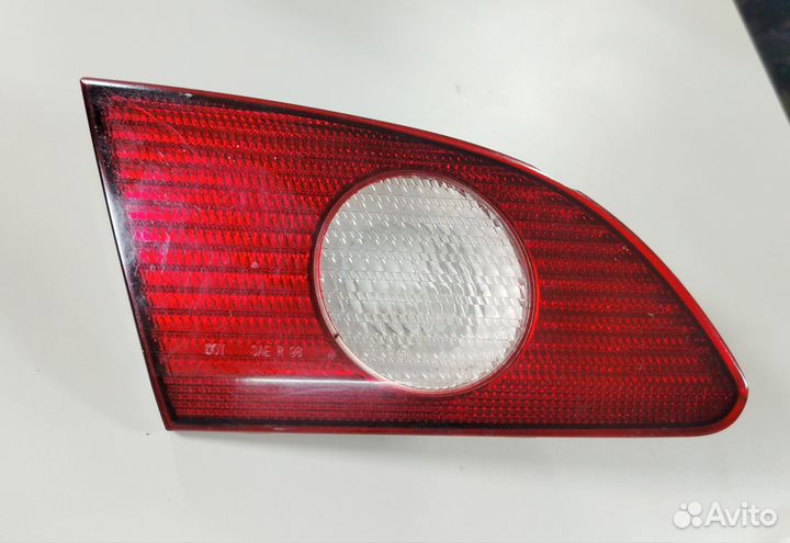 Фонарь в багажник левый Toyota Corolla ZZE110 USA