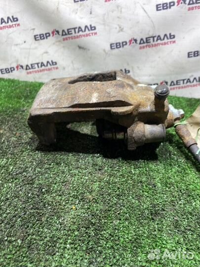 Суппорт тормозной передний левый Skoda Octavia A5