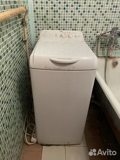 Стиральная вертикальной загрузкой