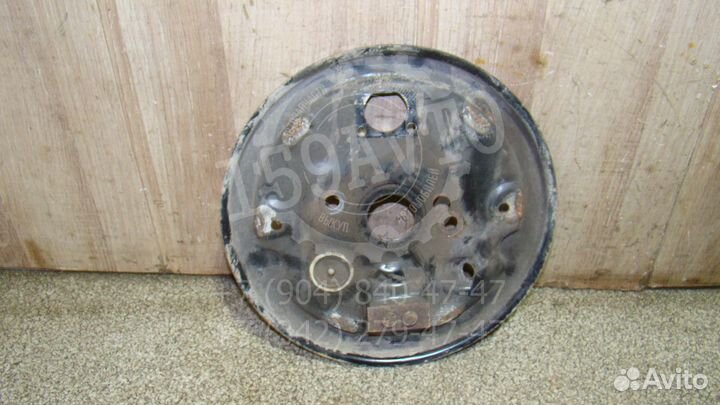 Щит опорный задний правый Opel Corsa D