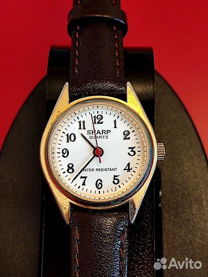 Часы sharp