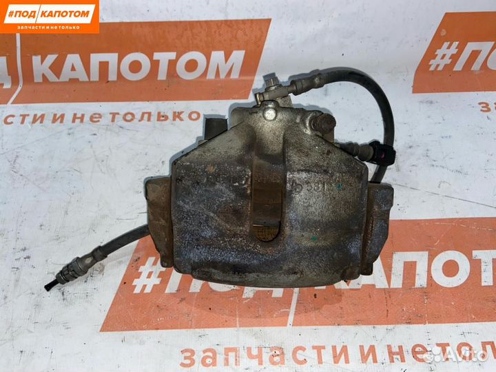 Суппорт тормозной передний левый Skoda Octavia