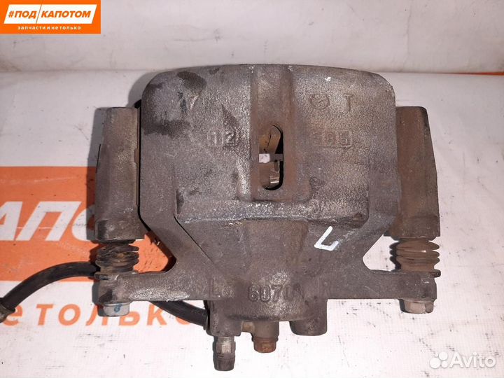 Суппорт тормозной передний левый Mazda CX-5 KE