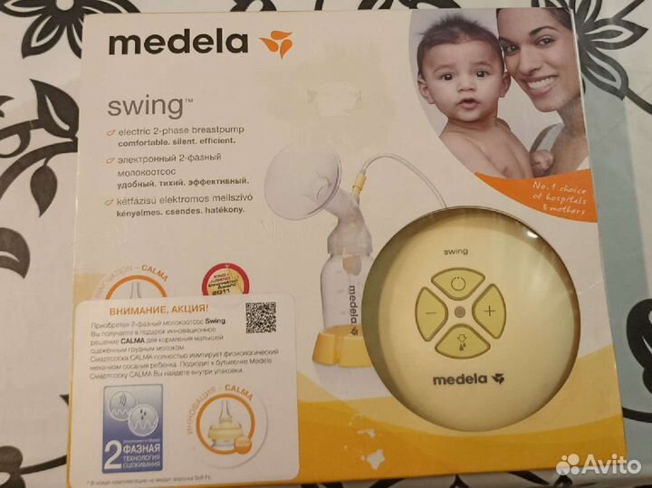 Молокоотсос medela электрический
