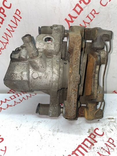 Суппорт тормозной задний правый Volvo V40 хетчбек