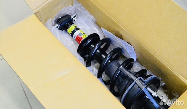 Амортизатор передний Cadillac Escalade 4 в сборе