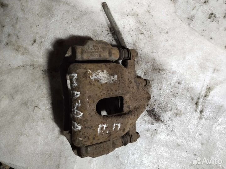 Тормозной суппорт передний правый mazda 3