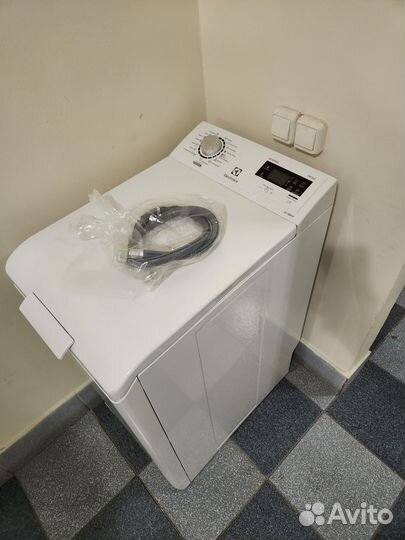 Стиральная машина с вертикальной загрузкой