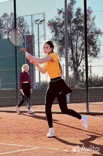 Тренер по большому теннису