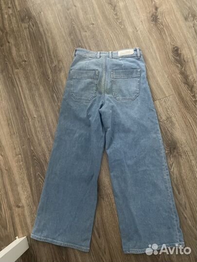 Джинсы новые
