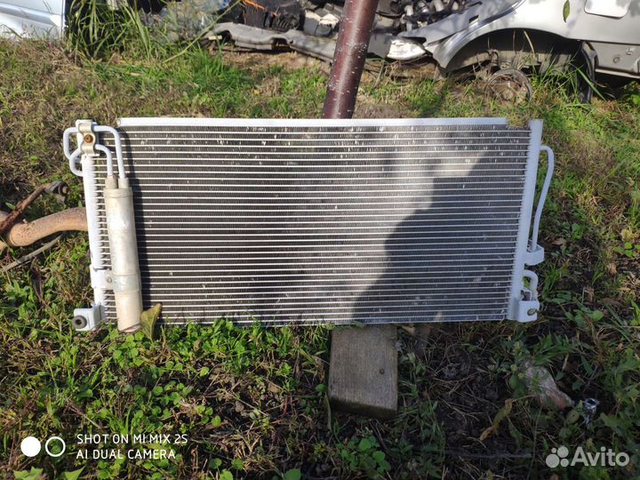 Радиатор кондиционера Ланцер 9