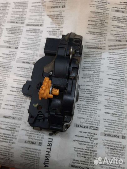 Замок передней левой двери на опель астра j