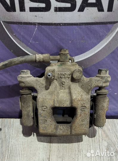 Суппорт тормозной задний Nissan juke F15 Лев