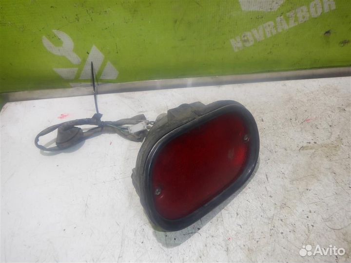 Фонарь задний в бампер левый Хендай Лантра 96-00