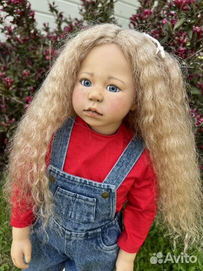 Виниловая кукла