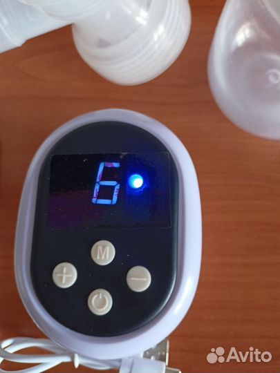 Молокоотсос электрический