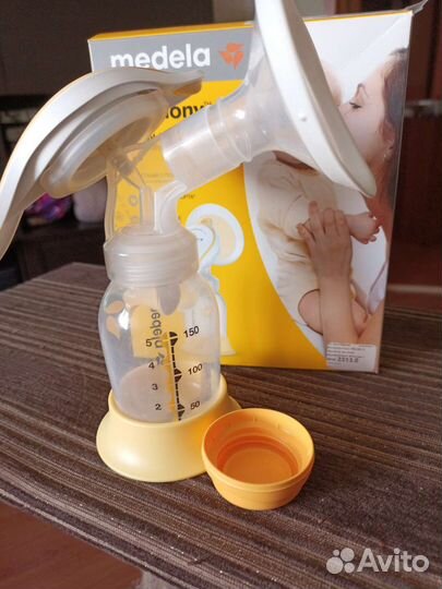 Молокоотсос medela