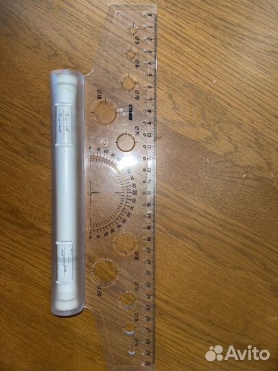 Линейка с роликом