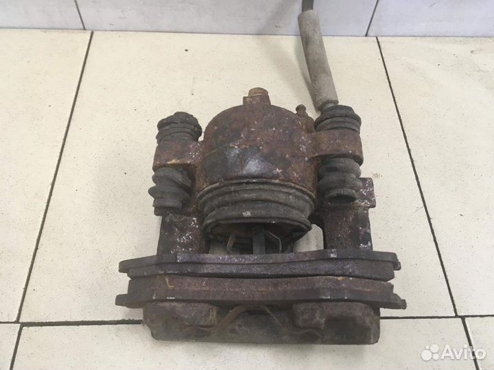 Суппорт передний левый Grand Cherokee (ZJ) 1993-1998