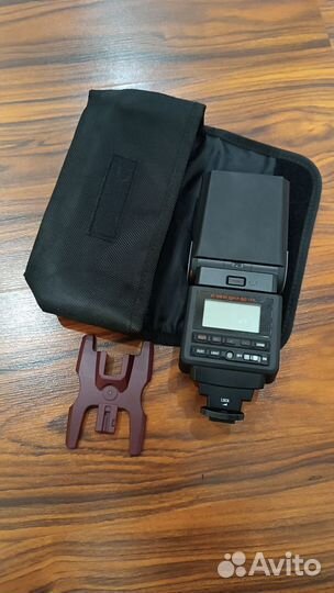 Вспышка Sigma EF-610 DG super