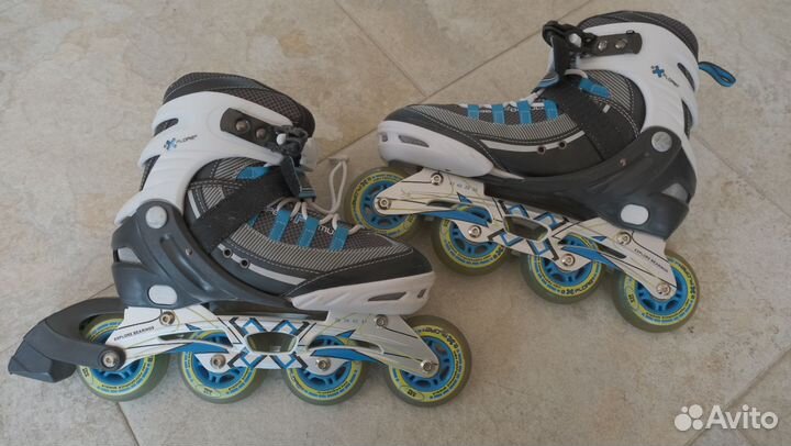 Роликовые коньки
