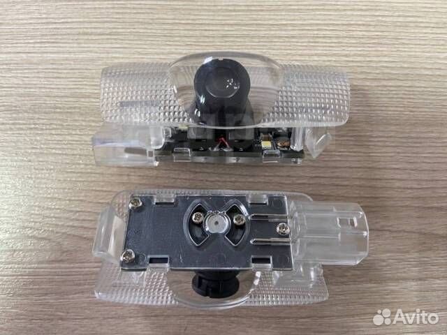 Подсветка обшивки двери (с проекцией) TLC 200 Exec