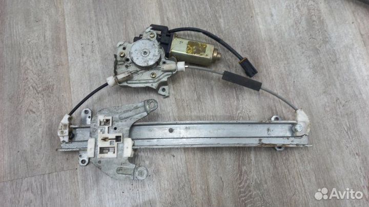 Стеклоподъемник задний левый Nissan Almera N15