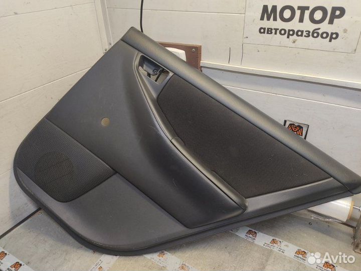 Обшивка двери задняя правая Toyota Corolla E12 1.6