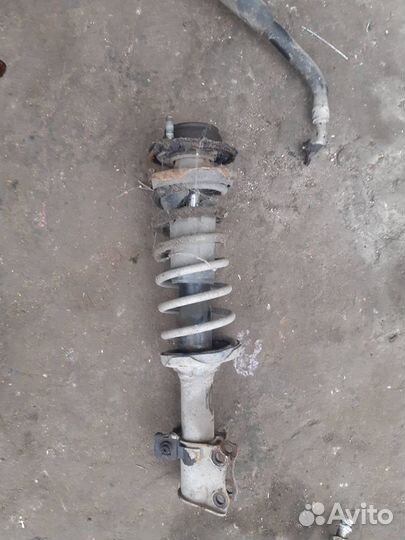 Передняя стойка Mazda Demio