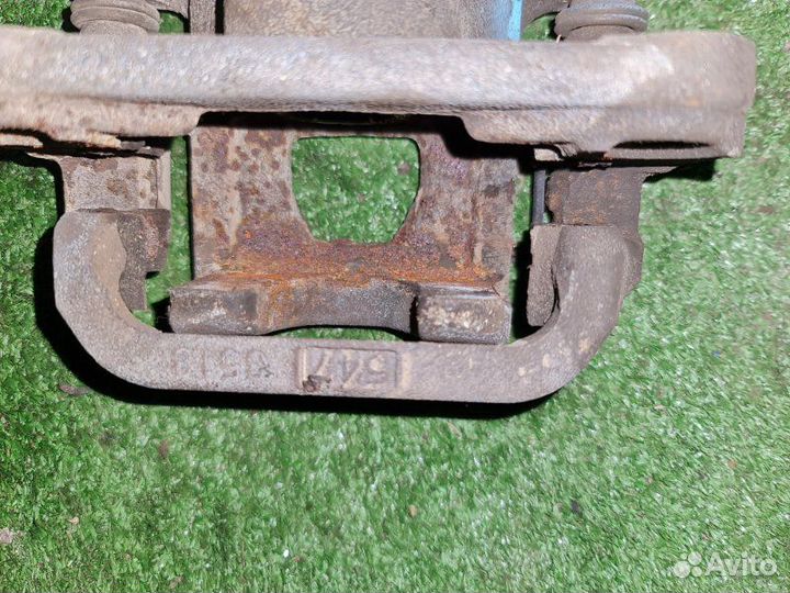 Суппорт тормозной задний правый Nissan Teana J31