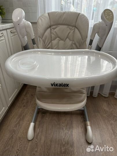 Детский стульчик-качели для кормления