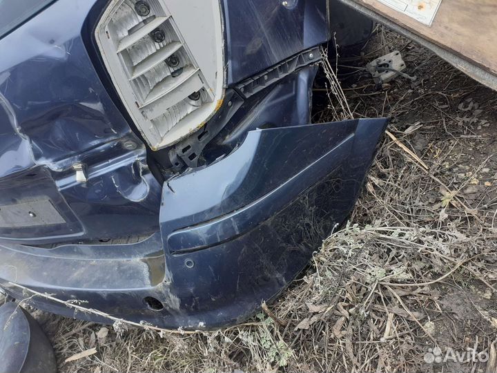 Задний бампер Opel Astra H