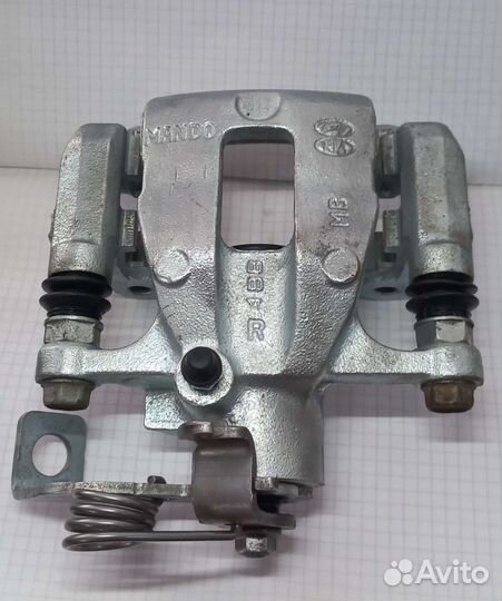 Задние тормозные суппорта Kia Rio 3