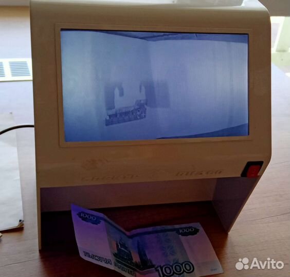 Оприделитель подлинности бумажных денег
