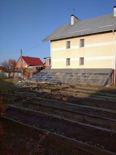 Коттедж 319 м² на участке 15 сот.