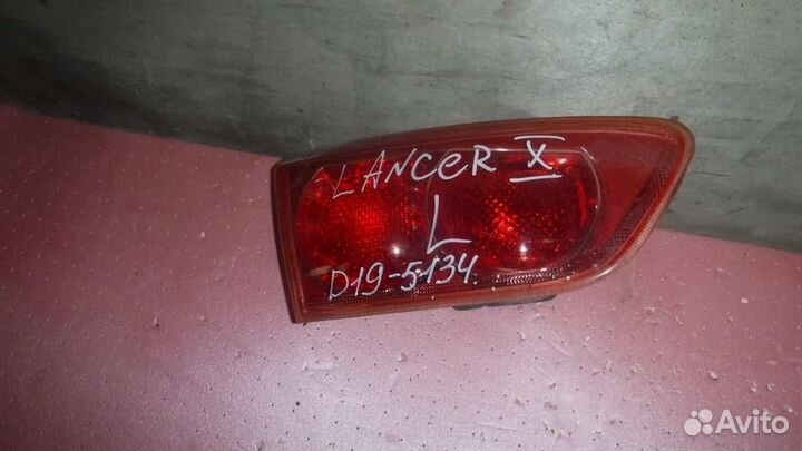 Фонарь задний внутренний левый Mitsubishi Lancer
