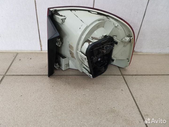 Фонарь левый наружный оригинал VW Touareg 1 7L